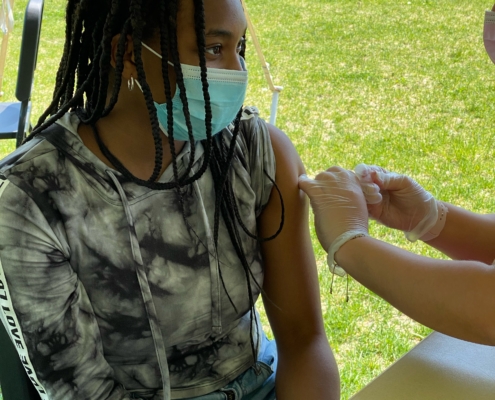 Student Getting COVID Vaccine